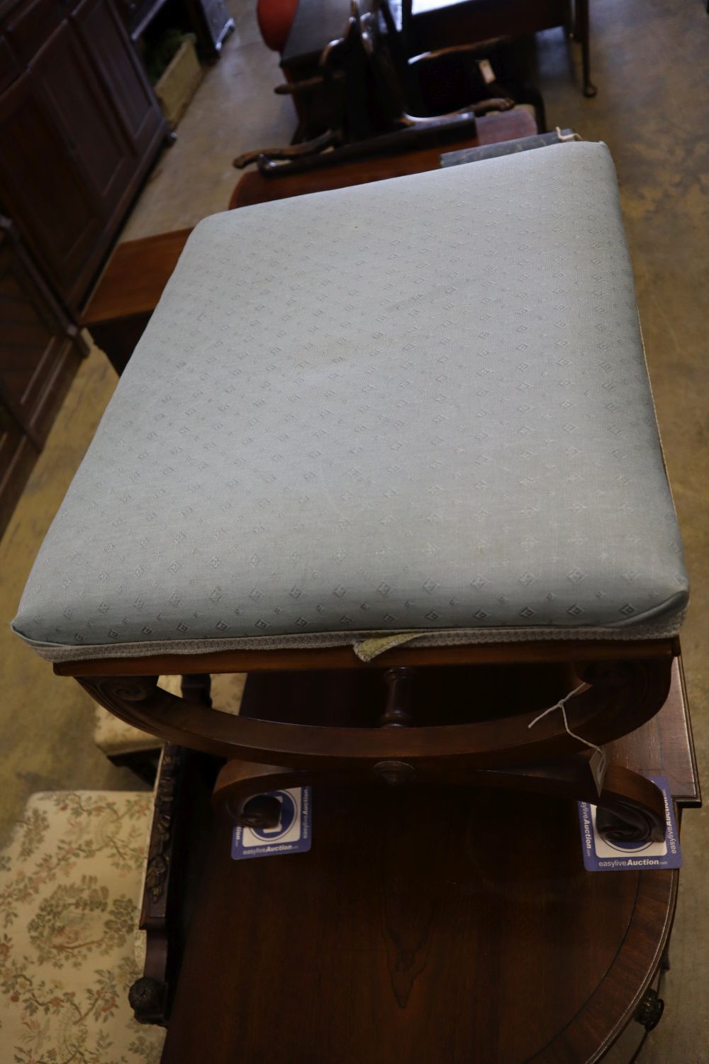 A Victorian walnut X-framed dressing stool on scroll-carved legs, width 58cm depth 50cm height 44cm